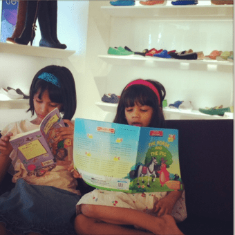 Diya and her sister Aanya like to carry books everywhere they go.